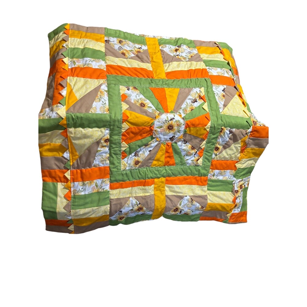 Cheerful,happy, colorful sunflower theme lap quilt or baby quilt. 41” x 40”